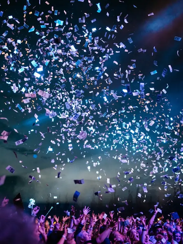 Confetti falling over a celebrating crowd